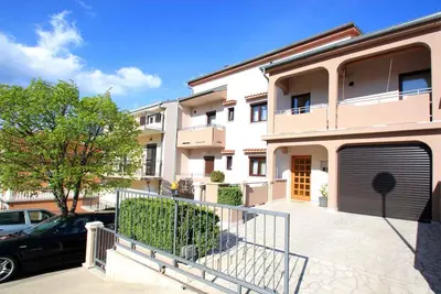 Image de Appartement de vacances avec barbecue et jardin