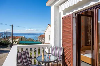 Image de Appartement de vacances avec balcon et vue sur la mer