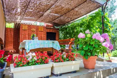 Image de Maison de vacances avec climatisation et terrasse avec barbecue