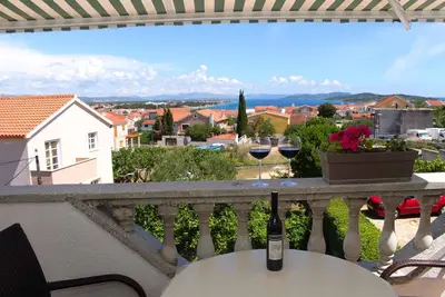 Image de Appartement de vacances avec balcon et vue sur la mer
