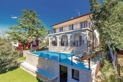 Image de Belle maison Ă Njivice avec WiFi