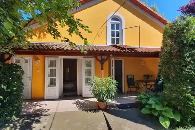 Image de Maison de vacances près de la plage dans un quartier populaire