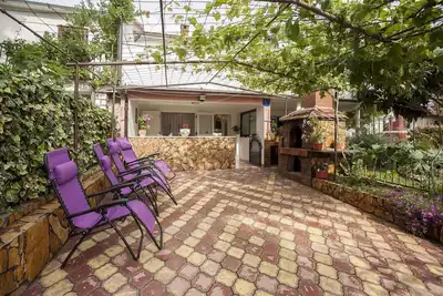 Image de Appartement de vacances avec baignoire à remous et barbecue