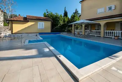 Image de Appartement de vacances avec piscine partagée