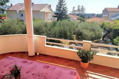 Image de Appartement de vacances avec grande terrasse, barbecue et jardin