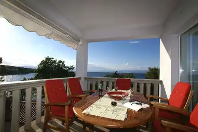 Image de Appartement de vacances avec climatisation et vue sur la mer