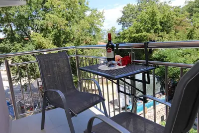 Image de Appartement de vacances avec balcon et climatisation