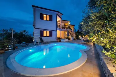 Image de Appartement de vacances avec piscine extérieure, sauna et jacuzzi