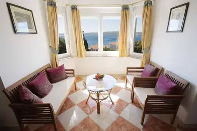 Image de Appartement de vacances avec climatisation et vue sur la mer