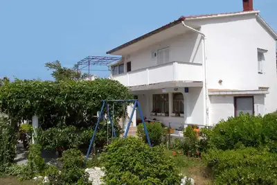 Image de Appartement de vacances avec climatisation et vue sur la mer
