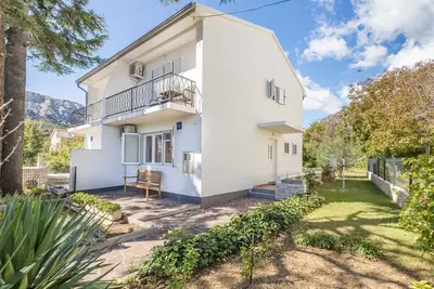 Image de Appartement de vacances avec jardin et air conditionné