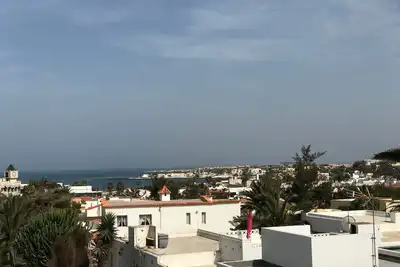 Image de Casa Maga - appartement spacieux avec une belle vue et une grande terrasse sur le toit