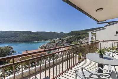 Image de Appartement de vacances avec climatisation et vue sur la mer