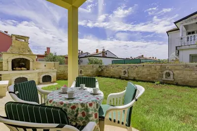 Image de Appartement de vacances avec jardin et climatisation