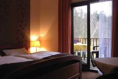 Image de Chambre 4 - Haus am Wald