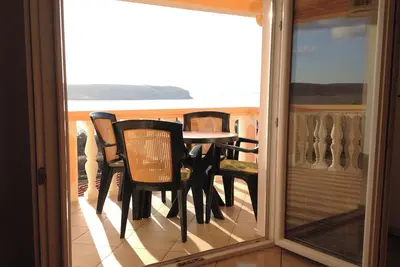 Image de Appartement de vacances avec climatisation et vue sur la mer