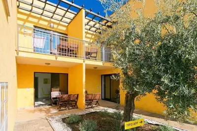 Image de Appartement de vacances avec terrasse et air conditionné