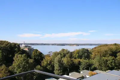 Image de Appartement Nordlicht avec chaise de plage sur le fjord - Appartement Nordlicht avec vue sur la mer