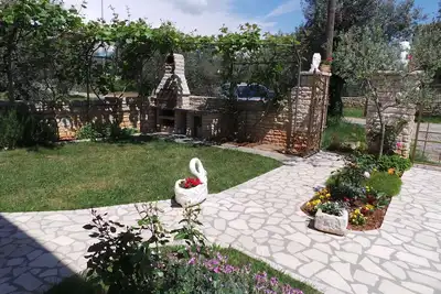 Image de Appartement de vacances avec barbecue dans le jardin