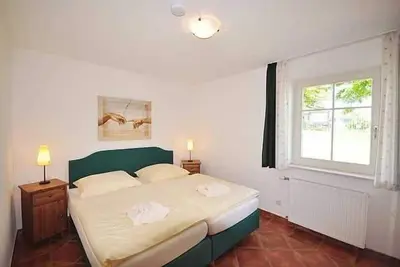 Image de Appartement de vacances 1 - Karolas Landhus sous le toit de chaume