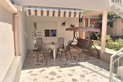 Image de Maison de vacances avec climatisation et jardin