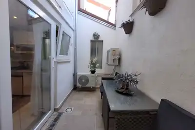 Image de Appartement de vacances avec terrasse privée et barbecue