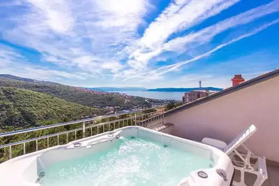 Image de Appartement de vacances avec bain à remous et vue panoramique