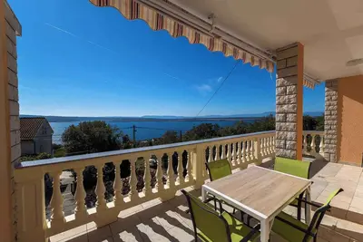 Image de Appartement de vacances avec climatisation et vue sur la mer
