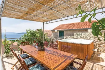Image de Maison acceptant les animaux à Podgora
