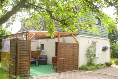 Image de Studio avec terrasse couverte et barbecue