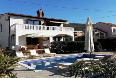 Appartement de vacances avec utilisation de piscine et balcon