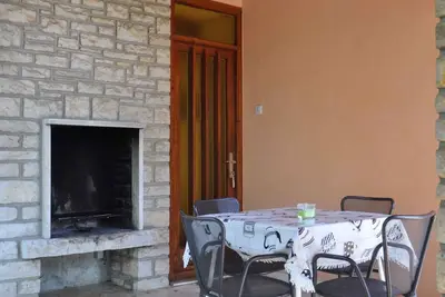 Image de Appartement de vacances avec foyer extérieur et vue sur la mer
