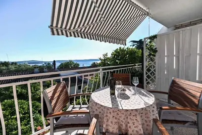 Image de Appartement de vacances avec climatisation et vue sur la mer