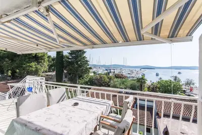 Image de Appartement de vacances avec climatisation et vue sur la mer