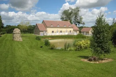 Image de Gîte familial de grand confort avec jardin, étang privé et salle de jeux proche Parc Naturel du Cotentin