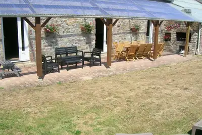 Image de Charmante maison en pierre avec 4 chambres, terrasse, proche du port de Goury et du sentier des douaniers