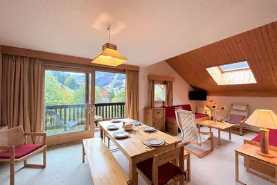 Image de Appartement skis aux pieds avec piscine et cheminée au centre de Méribel, 3 pièces pour 6 personnes