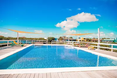 Image de Confortable condo en front de mer avec piscine commune - Ă pied de la plage voisine