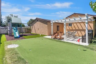 Image de Maison de vacances familiale avec golf Putting Green