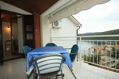 Image de Appartement de deux chambres avec la terrasse et la vue sur le mer Rabac, Labin (A-7474-a)