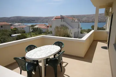 Image de Appartement de deux chambres avec la terrasse et la vue sur le mer Pag (A-6291-e)