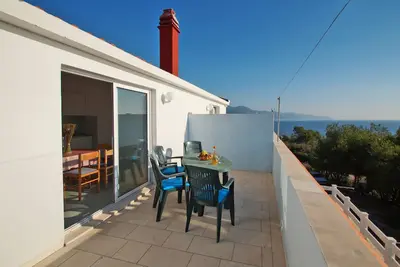 Image de Appartement de deux chambres avec la terrasse et la vue sur le mer Zavalatica, Korcula (A-247-a)