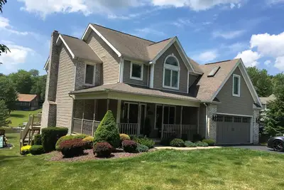 Image de Accueil Lakefront luxe: quai privé et zones de divertissement en plein air dans la station