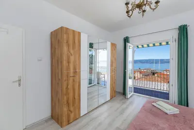 Image de Appartement de trois chambres avec le balcon et la vue sur le mer Sumpetar, Omis (A-950-a)