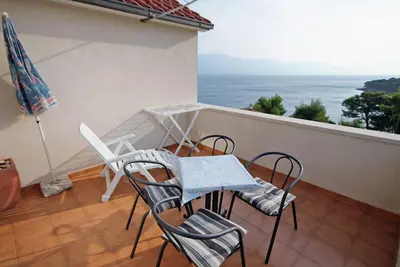 Image de Appartement d'une chambre avec la terrasse et la vue sur le mer Postira, Brac (A-3244-b)