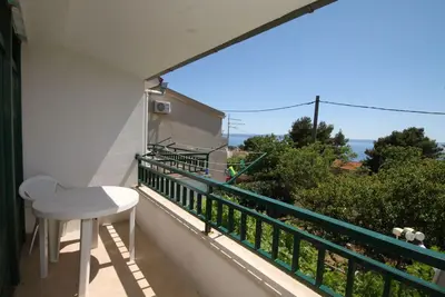 Image de Appartement de trois chambres avec la terrasse et la vue sur le mer Makarska (A-6791-a)