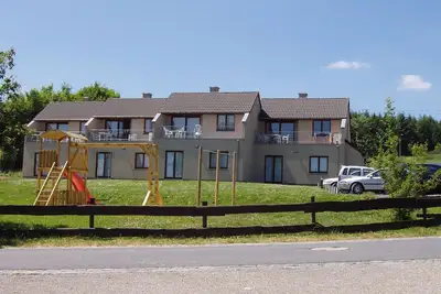 Image de Sapinière Type F08 - Quatre Chambres Chalet, Couchages 8