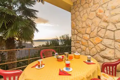 Image de Appartement de vacances avec terrasse et air conditionné