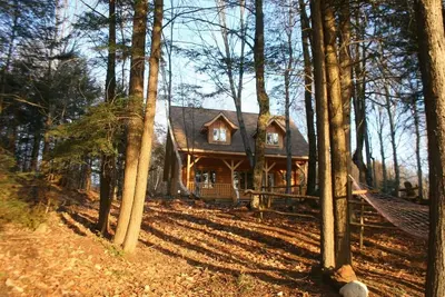 Image de Belle maison en rondins sur le lac tranquille privé