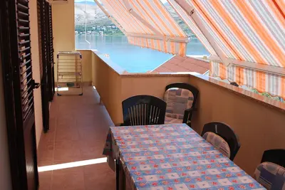 Appartement de deux chambres avec la terrasse et la vue sur le mer Pag (A-11487-b)